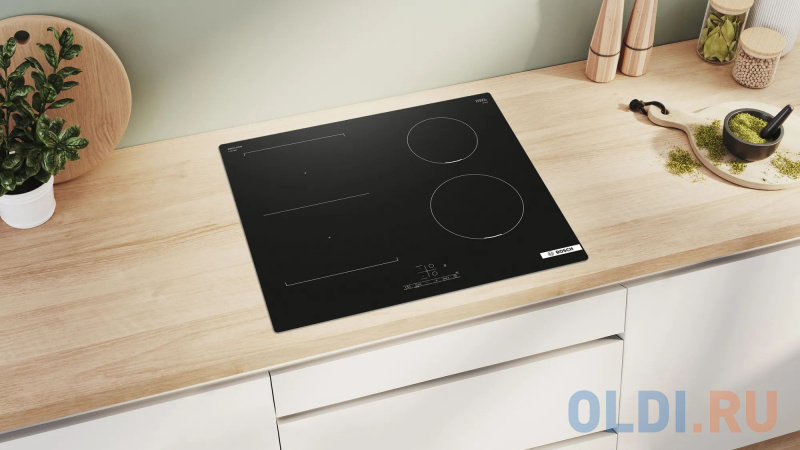 Варочная панель индукционная Bosch PVS611BB6E черный фото